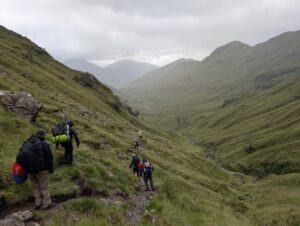 A group of hikers, walking to The Old Forge Pub.