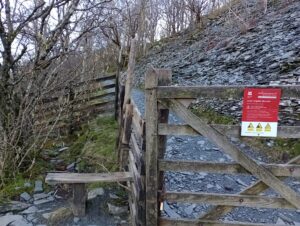 Cathedral Quarry Walk. Gate and stile to the cave