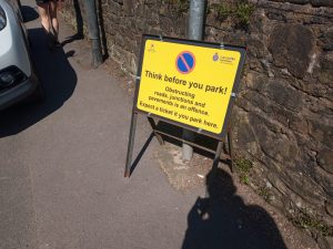 Parking warnings placed all the way up Avenue Road in Hurst Green